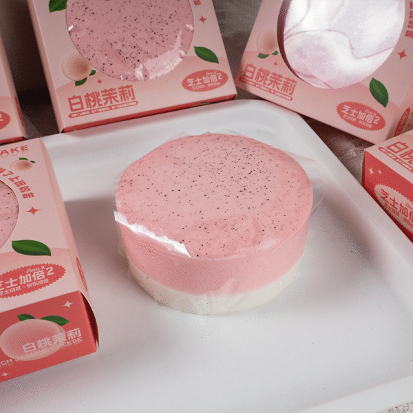 Peach Cheesecake Squishy – Pink & White Slow Rising Dessert Toy for Stress Relief
